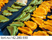 Empanada - popular dish on the Iberian Peninsula and in Latin America. Стоковое фото, фотограф Яков Филимонов / Фотобанк Лори