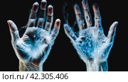 Human hands created from water on a black background. Стоковое AI-изображение, AI-художник ALLA YURTAYEVA / Фотобанк Лори