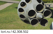 Rocket launcher under the wing of a fighter jet. Weapon pods under the wing of a military aircraft. A close-up view. A tube of a missile launcher. Стоковое видео, видеограф Воловодов Владимир / Фотобанк Лори