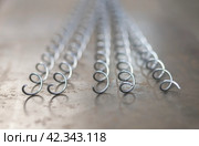 Metal material for making gabions. Mesh, spirals. Стоковое фото, фотограф Плотников Дмитрий / Фотобанк Лори