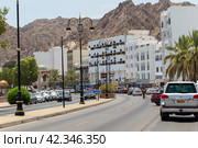 Mutrah Corniche with the Mutrah Fort in Muscat. View of a fort in Muttrah district of Muscat. Sultanate of Oman (2023 год). Редакционное фото, фотограф Евгений Ткачёв / Фотобанк Лори