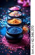 Holi background, colored powder on dark background with empty space for design. Стоковое AI-изображение, AI-художник Мария Фадеева / Фотобанк Лори