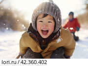 Joyful Smiling kid sledding snow outdoor nature. Generate Ai. Стоковое AI-изображение, AI-художник Иван Рябоконь / Фотобанк Лори