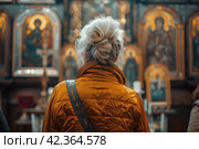 The Encounter of the Faithful with the Divine: Prayer before Icons, in the Name of Faith and Humility, in Church Holiness. Стоковое AI-изображение, AI-художник Юрий Поздников / Фотобанк Лори