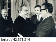 Председатель Президиума Верховного Совета СССР Н.В. Подгорный и Генеральный секретарь ЦК КПСС Л.И. Брежнев с президентом Чили Сальвадором Альенде перед началом советско-чилийских переговоров в Кремле, 6 декабря 1972 года. Редакционное фото, фотограф Сергей Елизарьев / Фотобанк Лори