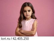 Serious funny little girl in pink dress arms crossed at pink backdrop, posing serious looking. Lovely kid lady coquette expressing emotion, studio shot. Child image emotion concept. Copy ad text space. Стоковое AI-изображение, AI-художник Aleksandr Golubev / Фотобанк Лори
