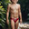 Милый мальчик на пляже под дождём | Cute little boy on the beach in the rain. Стоковое AI-изображение, AI-художник Данил Рыбаков / Фотобанк Лори