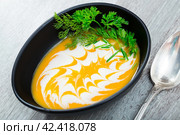 Add whisked cream with garlic and ginger. Serve with greens. Стоковое фото, фотограф Яков Филимонов / Фотобанк Лори