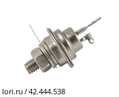 Мощный тиристор на белом фоне. Powerful thyristor on a white background. Стоковое фото, фотограф Татьяна Д / Фотобанк Лори