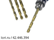 Электрическая дрель и сверла на белом фоне. Electric drill and drills on a white background. Стоковое фото, фотограф Татьяна Д / Фотобанк Лори