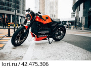 BMW K 100 RT custom motorcycle parked on a street. BMW K100 motorbike on background of modern city (2022 год). Редакционное фото, фотограф Константин Григорьев / Фотобанк Лори