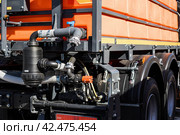 Back of a truck with equipment for washing, sweeping and dusting roads. Rear part of water tank with water pump with hydraulic drive. Стоковое фото, фотограф Константин Григорьев / Фотобанк Лори