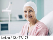 Cancer ill elderly woman smiling. Generate Ai. Стоковое AI-изображение, AI-художник Иван Рябоконь / Фотобанк Лори