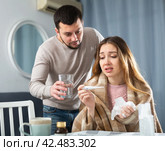 Sick woman resting at home with husband. Стоковое фото, фотограф Яков Филимонов / Фотобанк Лори