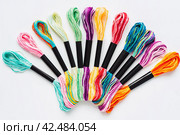 Many skeins of mouline thread for embroidery melange background. Стоковое фото, фотограф Татьяна Терехина / Фотобанк Лори