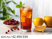 Glass of refreshing tamarind drink and fresh fruits on table. Generate Ai. Стоковое AI-изображение, AI-художник Иван Рябоконь / Фотобанк Лори