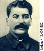 Сталин (Джугашвили) Иосиф Виссарионович (1879-1953) - секретарь ЦК ВКП(б), председатель Совета Народных Комиссаров. Середина 1930-х годов. Редакционное фото, фотограф Сергей Елизарьев / Фотобанк Лори
