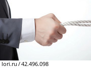 Dispute concept businessman pulling rope isolated on white. Generate Ai. Стоковое AI-изображение, AI-художник Иван Рябоконь / Фотобанк Лори