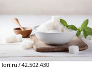 Sugar bowl scoop on wooden board. Generate Ai. Стоковое AI-изображение, AI-художник Иван Рябоконь / Фотобанк Лори