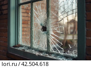 Damaged window glass. Generate ai. Стоковое AI-изображение, AI-художник Иван Рябоконь / Фотобанк Лори