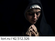 Mysterious nun portrait on dark background. Generate ai. Стоковое AI-изображение, AI-художник Иван Рябоконь / Фотобанк Лори