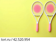 Intersected Crossed tennis rackets. Generate Ai. Стоковое AI-изображение, AI-художник Иван Рябоконь / Фотобанк Лори