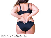 Plus size model in black lingerie, overweight female body, fat woman with cellulitis on thighs, isolated on white background. Стоковое AI-изображение, AI-художник Станислав Тарко / Фотобанк Лори