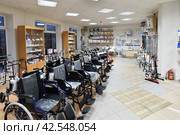 Moscow, Russia - Mar 28. 2024. Wheelchairs in a medical store in Zelenograd. Редакционное фото, фотограф Володина Ольга / Фотобанк Лори