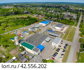 Вид с высоты на молочный комбинат в Зуевке (аэросъемка 2021 года) Стоковое фото, фотограф Владислав Самошкин / Фотобанк Лори
