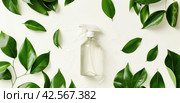 water and oil repellant spray surrounded by green leaves. Стоковое AI-изображение, AI-художник Юлия Гапеенко / Фотобанк Лори