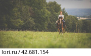 Pretty, young, redhead woman with her lovely horse, during her favorite leisure. Стоковое фото, фотограф Viktor Cap / PantherMedia / Фотобанк Лори