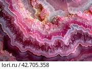 Close-up of an agate, a gemstone characterized by parallel bands of varying shades. Colors range from soft pink to deep burgundy, with vibrant crystal formations and whitish tops. Стоковое AI-изображение, AI-художник Анна Кривицкая / Фотобанк Лори