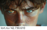 A Young Man's Stern Gaze: A Soul-Stirring Truth. Стоковое AI-изображение, AI-художник Юрий Поздников / Фотобанк Лори