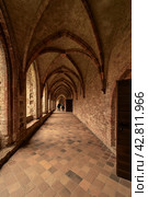 CHORIN, GERMANY - APRIL 01, 2024: Ruin of Chorin Abbey. Chorin Abbey (Kloster Chorin) is a former Cistercian abbey. An example of Gothic architecture. Founded in 1258. It was secularized in 1542. Редакционное фото, фотограф Sergey Kohl / Фотобанк Лори