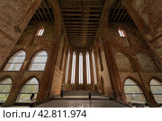 CHORIN, GERMANY - APRIL 01, 2024: Ruin of Chorin Abbey. Chorin Abbey (Kloster Chorin) is a former Cistercian abbey. An example of Gothic architecture. Founded in 1258. It was secularized in 1542. Редакционное фото, фотограф Sergey Kohl / Фотобанк Лори