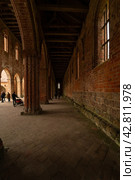 CHORIN, GERMANY - APRIL 01, 2024: Ruin of Chorin Abbey. Chorin Abbey (Kloster Chorin) is a former Cistercian abbey. An example of Gothic architecture. Founded in 1258. It was secularized in 1542. Редакционное фото, фотограф Sergey Kohl / Фотобанк Лори