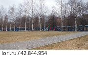 Petrozavodsk, Russia, 04.14.2024: City historical embankment of Lake Onega. Sights of the capital of Karelia. Tourism, sports, small architectural forms. People are walking. Outdoor sports equipment. Редакционное видео, видеограф Юлия Петровская / Фотобанк Лори