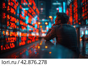 A man in a business suit looks thoughtfully at the busy streets of the city with bright neon lighting. This image is full of atmosphere and can be interpreted as a moment of reflection on life's journey or as a break from the fast pace of modern life. Стоковое AI-изображение, AI-художник Анна Кривицкая / Фотобанк Лори