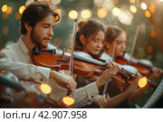 Orchestra with violins in the garden. Стоковое AI-изображение, AI-художник Анна Кривицкая / Фотобанк Лори