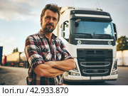 Professional male truck driver with a truck in the background. Стоковое AI-изображение, AI-художник Александр Довянский / Фотобанк Лори