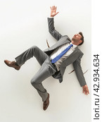 Businessman Falling Down. Стоковое AI-изображение, AI-художник Кирилл Черезов / Фотобанк Лори