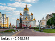 Saransk, Russia - June 5, 2023. Cathedral of St. Theodore Ushakov in Saransk, Russia. It is named after the Russian saint and admiral Fyodor Ushakov. The inscription above the entrance of the Cathedral of the Holy Righteous Warrior Theodore Ushakov. Редакционное фото, фотограф Оксана Медведева / Фотобанк Лори
