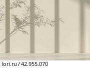 Minimal abstract background with light and shadow of tree leaves. Cosmetic product presentation. Premium podium. Pastel beige peach fuzz wall, white table. Showcase display case. Front view. Mockup ad. Стоковое AI-изображение, AI-художник Марина Демидюк / Фотобанк Лори