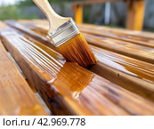 Applying Varnish to Wooden Surface. Стоковое AI-изображение, AI-художник Кирилл Черезов / Фотобанк Лори