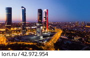 Night view of the four towers of the business district in Madrid. Стоковое фото, фотограф Яков Филимонов / Фотобанк Лори