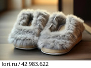 Fuzzy Pair of grey slippers on floor. Generate Ai. Стоковое AI-изображение, AI-художник Иван Рябоконь / Фотобанк Лори