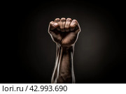 Indistinct Raised fist blurry. Generate AI. Стоковое AI-изображение, AI-художник Иван Рябоконь / Фотобанк Лори