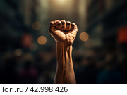 Defiant Raised fist blurry. Generate AI. Стоковое AI-изображение, AI-художник Иван Рябоконь / Фотобанк Лори