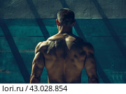 Athletic man backview. Generate Ai. Стоковое AI-изображение, AI-художник Иван Рябоконь / Фотобанк Лори