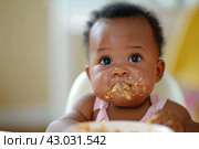 Voracious Afroamerican baby eating. Generate Ai. Стоковое AI-изображение, AI-художник Иван Рябоконь / Фотобанк Лори